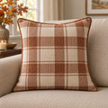AI-generated concept mockup of a cream and rust fall plaid throw pillow